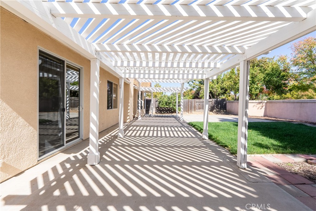 830 Sycamore Canyon Road Paso Robles, CA 93446 - Photo 23 of 27 a view of a porch with wooden floor and stairs