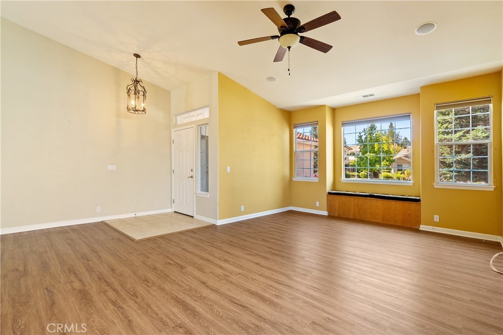 830 Sycamore Canyon Road Paso Robles, CA 93446 - Photo 3 of 27 a view of empty room with wooden floor and fan