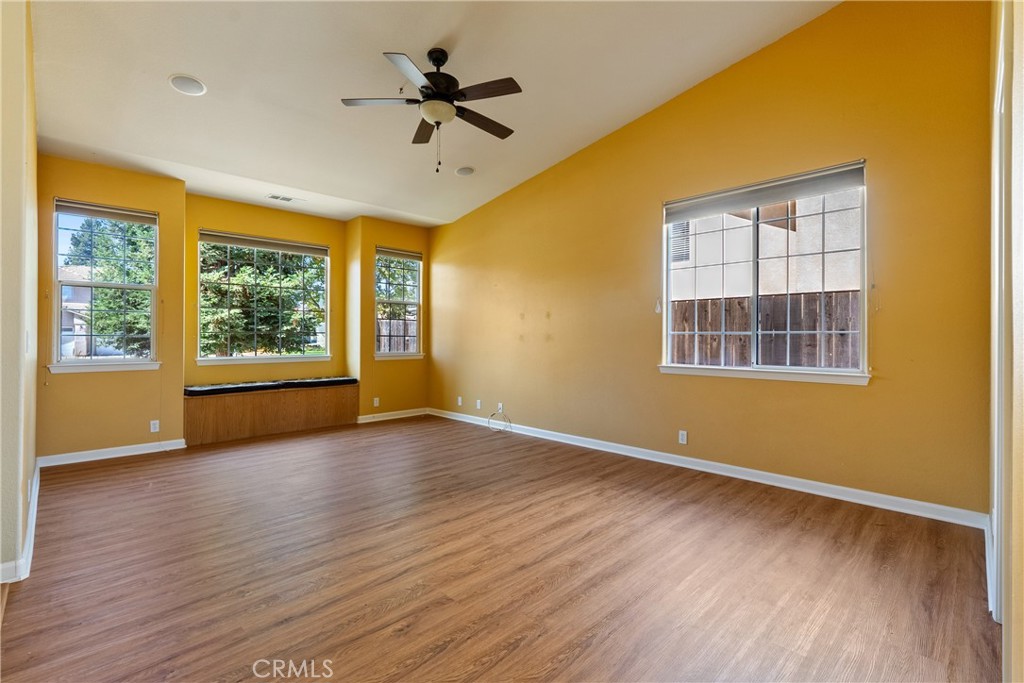 830 Sycamore Canyon Road Paso Robles, CA 93446 - Photo 4 of 27 a view of an empty room with a window and wooden floor