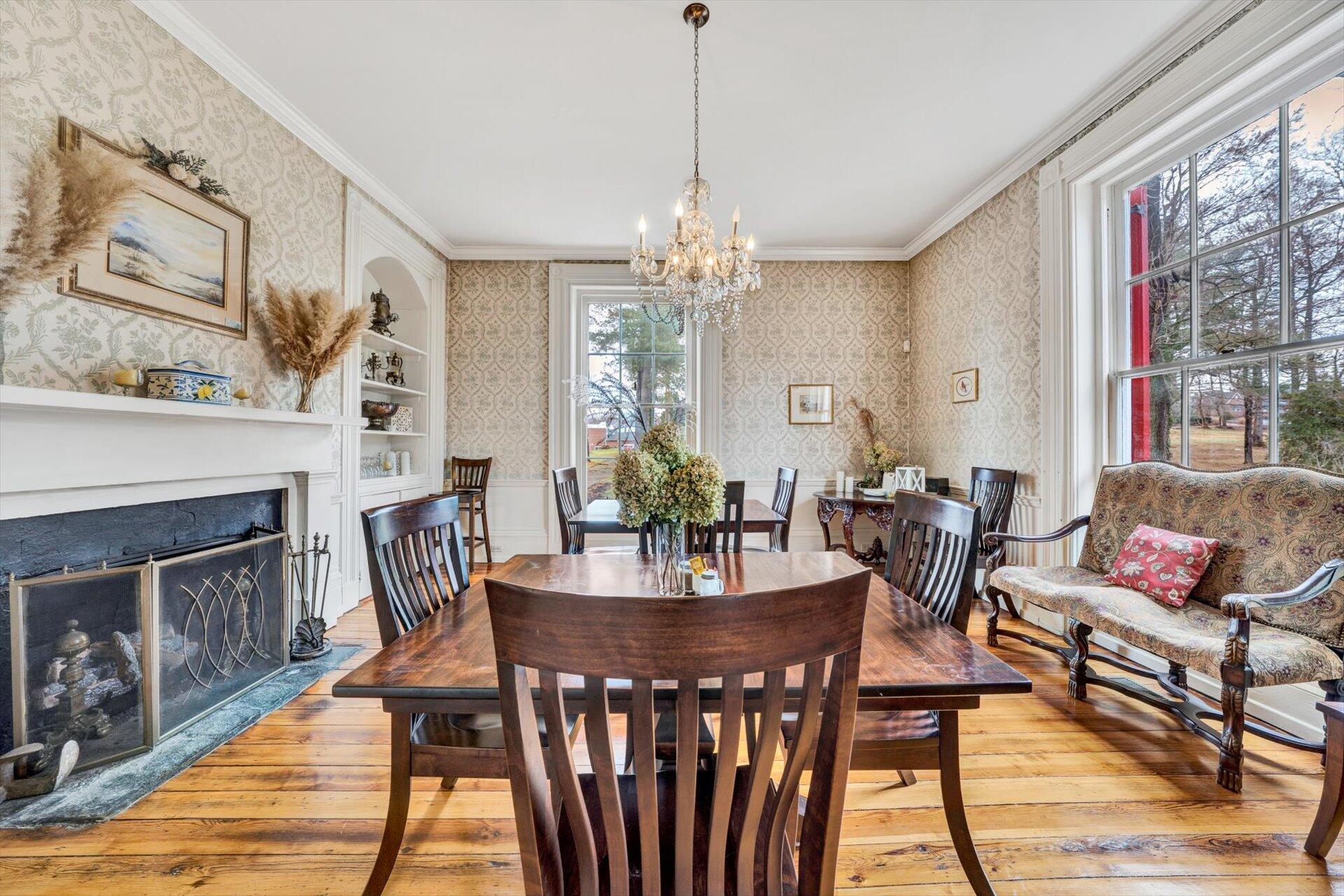 50 Floyd Avenue Rocky Mount, VA 24151 - Photo 4 of 73 a view of a dining room with furniture window and wooden floor