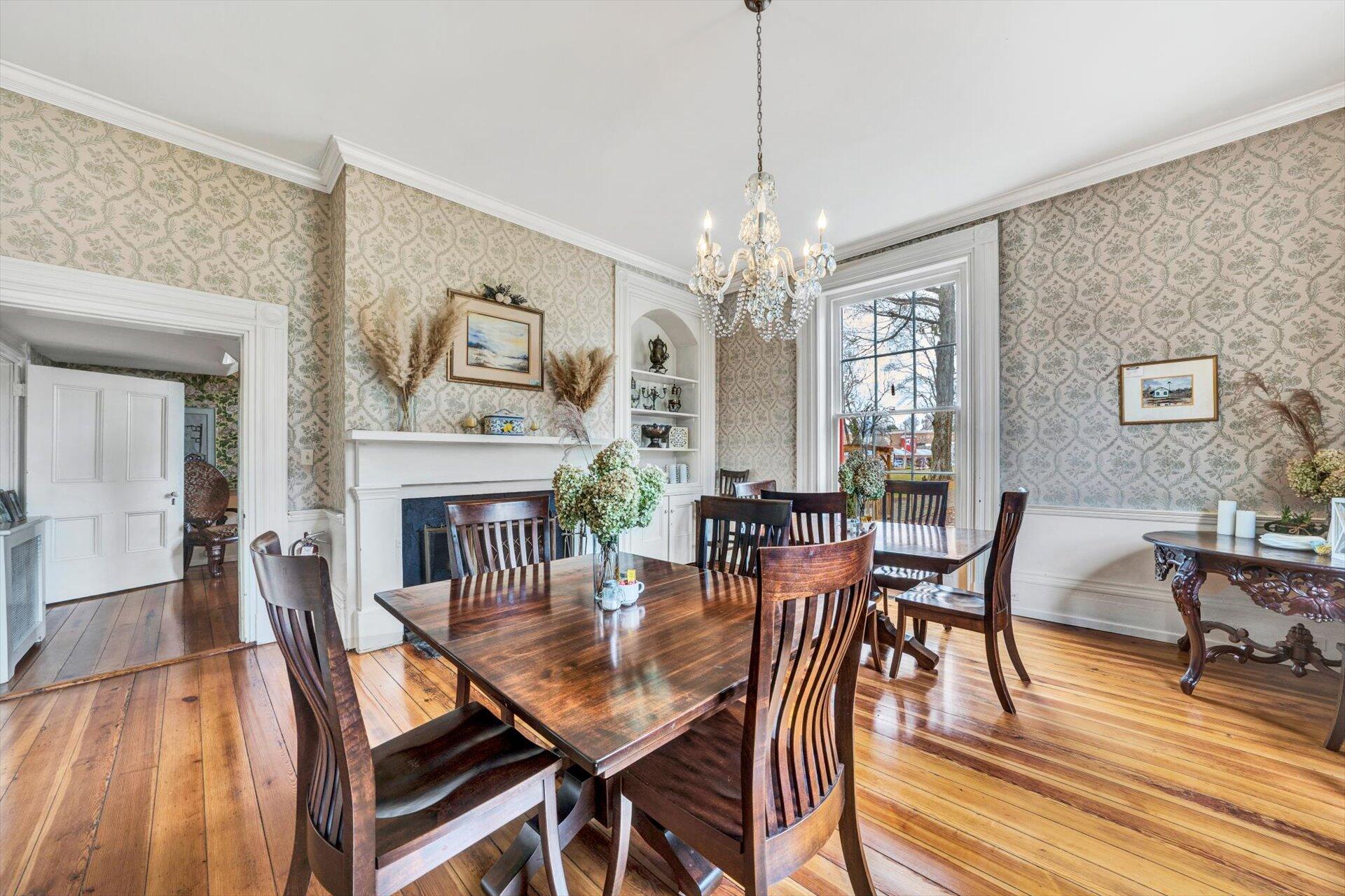 50 Floyd Avenue Rocky Mount, VA 24151 - Photo 5 of 73 a view of a dining room with furniture a chandelier and wooden floor