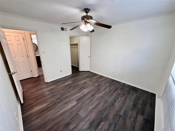 a view of a livingroom with wooden floor