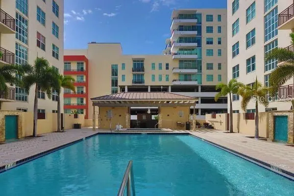 a view of a building with a yard