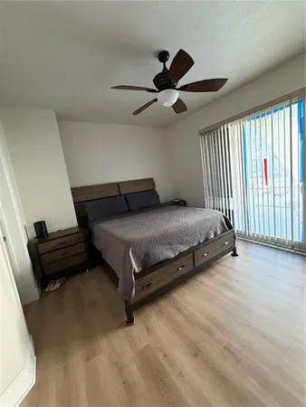 a bedroom with a bed and furniture