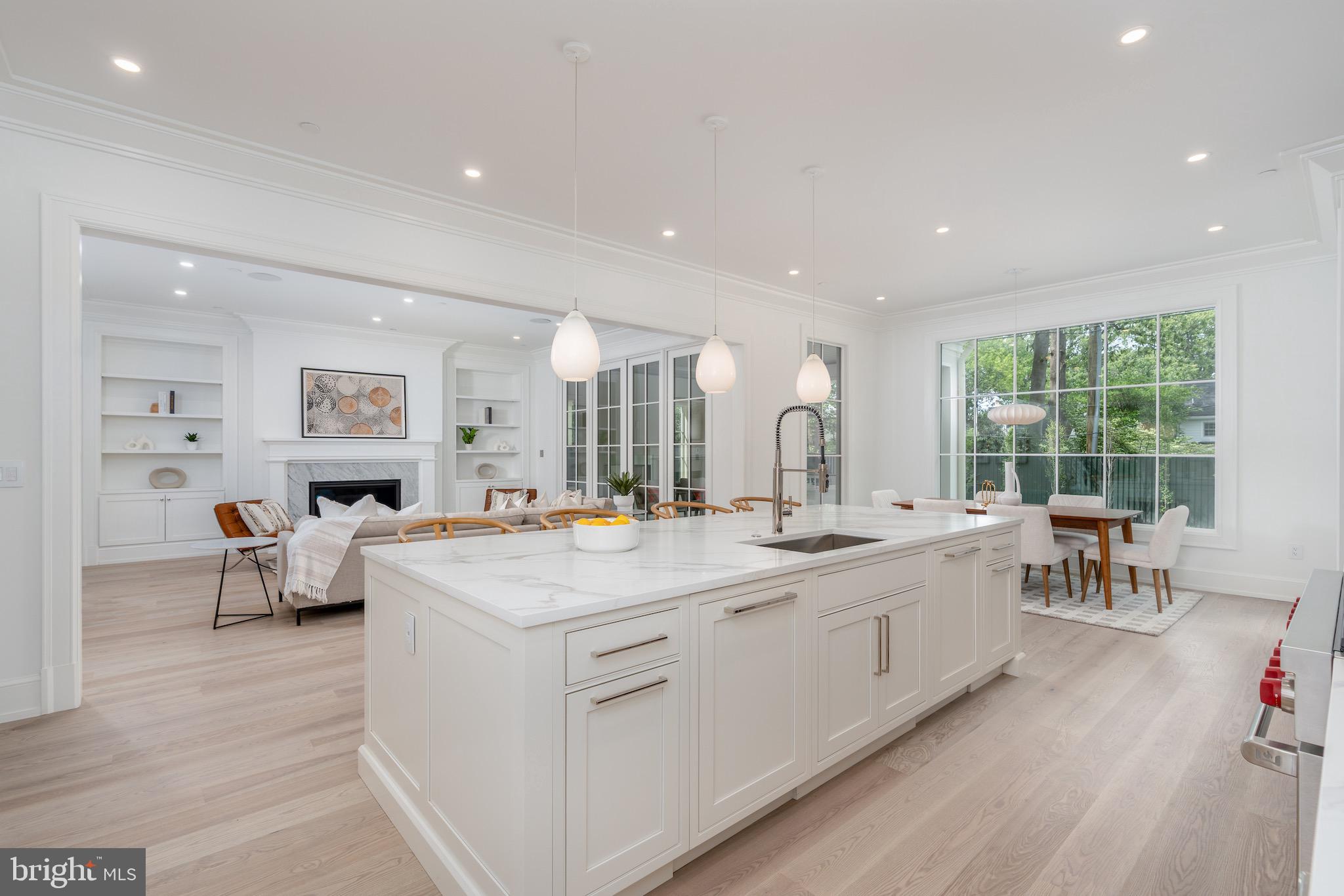 4821 Rodman Street Northwest Washington, DC 20016 - Photo 24 of 52 a large kitchen with kitchen island a large island in it