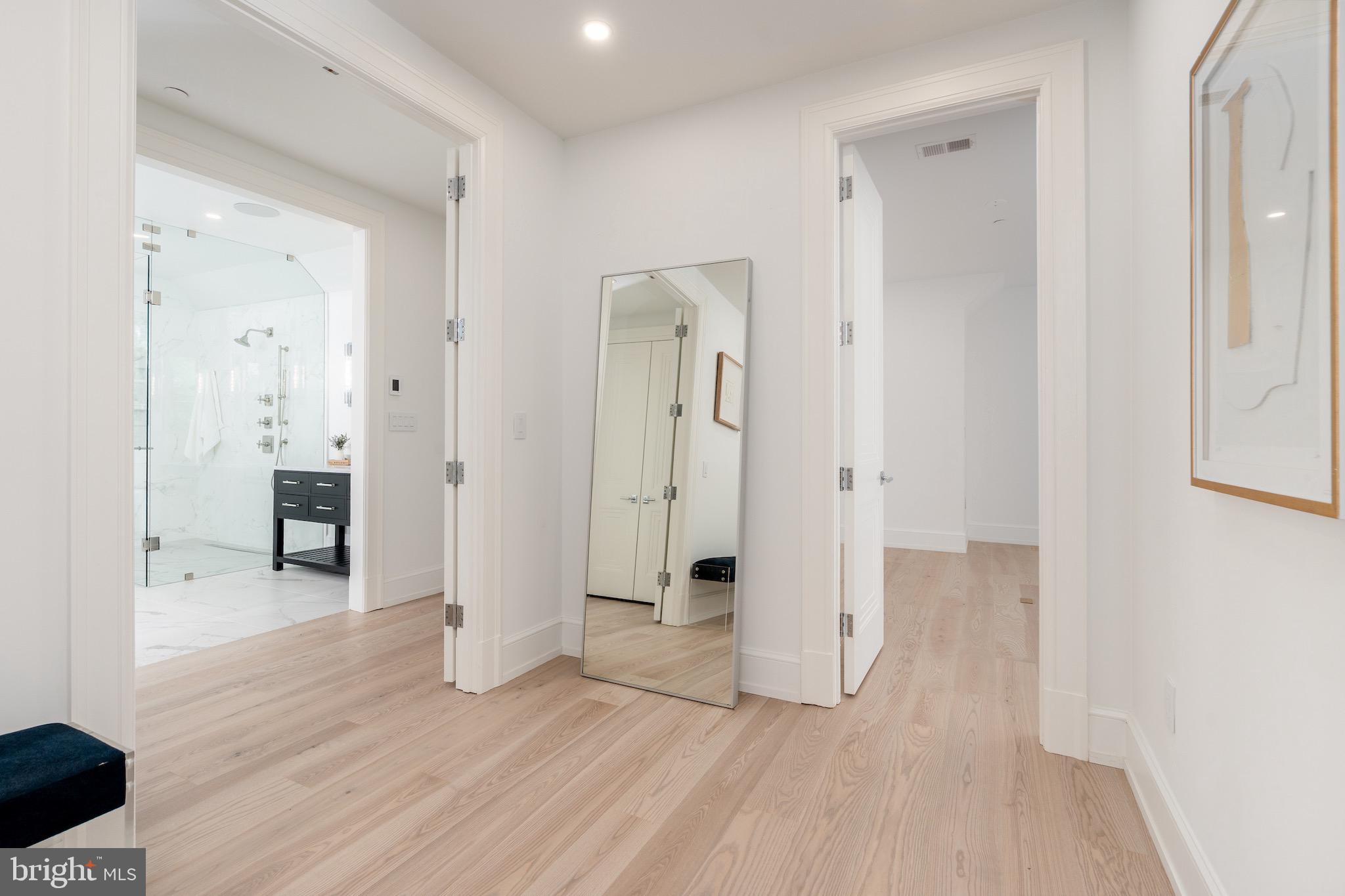 4821 Rodman Street Northwest Washington, DC 20016 - Photo 35 of 52 wooden floor with white walls