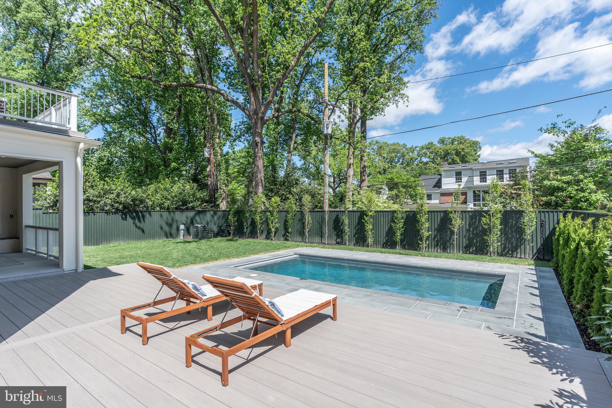 4821 Rodman Street Northwest Washington, DC 20016 - Photo 49 of 52 a view of swimming pool with lounge chair