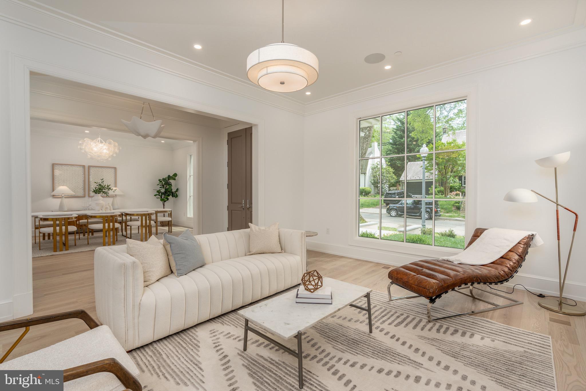 4821 Rodman Street Northwest Washington, DC 20016 - Photo 9 of 52 a living room with furniture and a large window