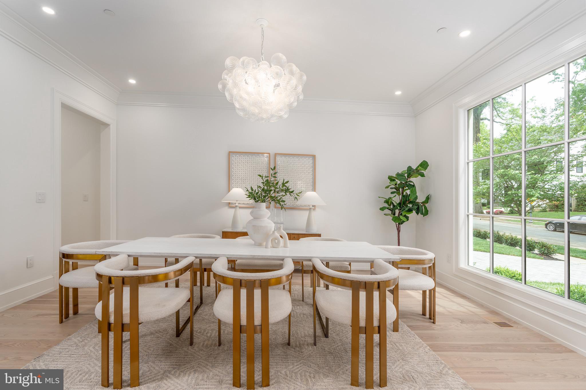 4821 Rodman Street Northwest Washington, DC 20016 - Photo 10 of 52 a view of a dining room with furniture window and outside view