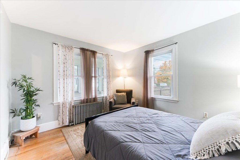 34 Julian Road Randolph, MA 02368 - Photo 13 of 19 a bedroom with a large bed and a window