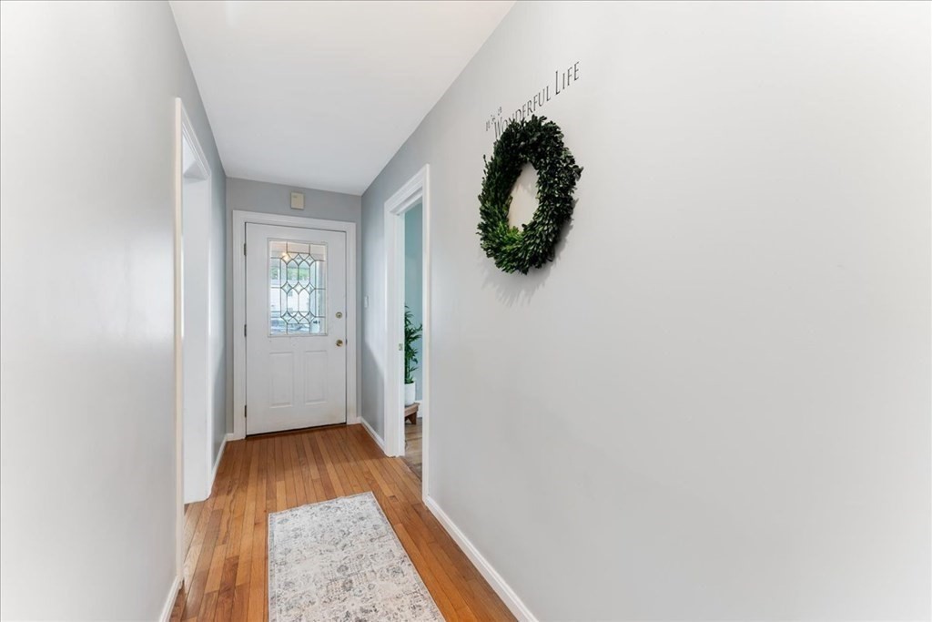 34 Julian Road Randolph, MA 02368 - Photo 14 of 19 a view of hallway with wooden floor