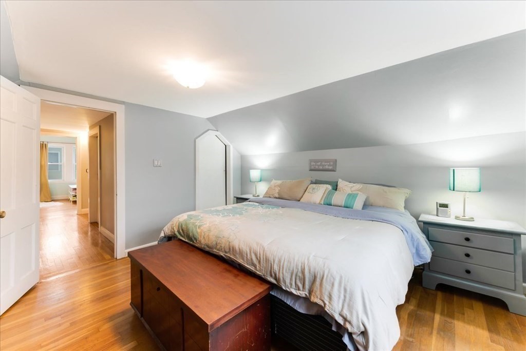 34 Julian Road Randolph, MA 02368 - Photo 15 of 19 a bedroom with a bed and wooden floor