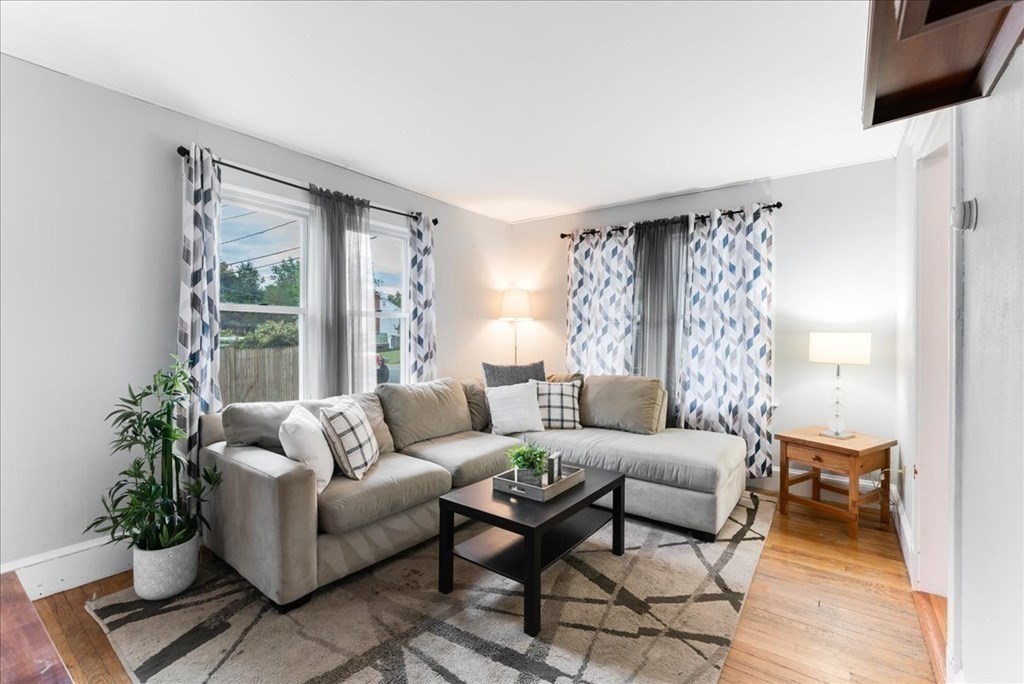 34 Julian Road Randolph, MA 02368 - Photo 10 of 19 a living room with furniture and a large window