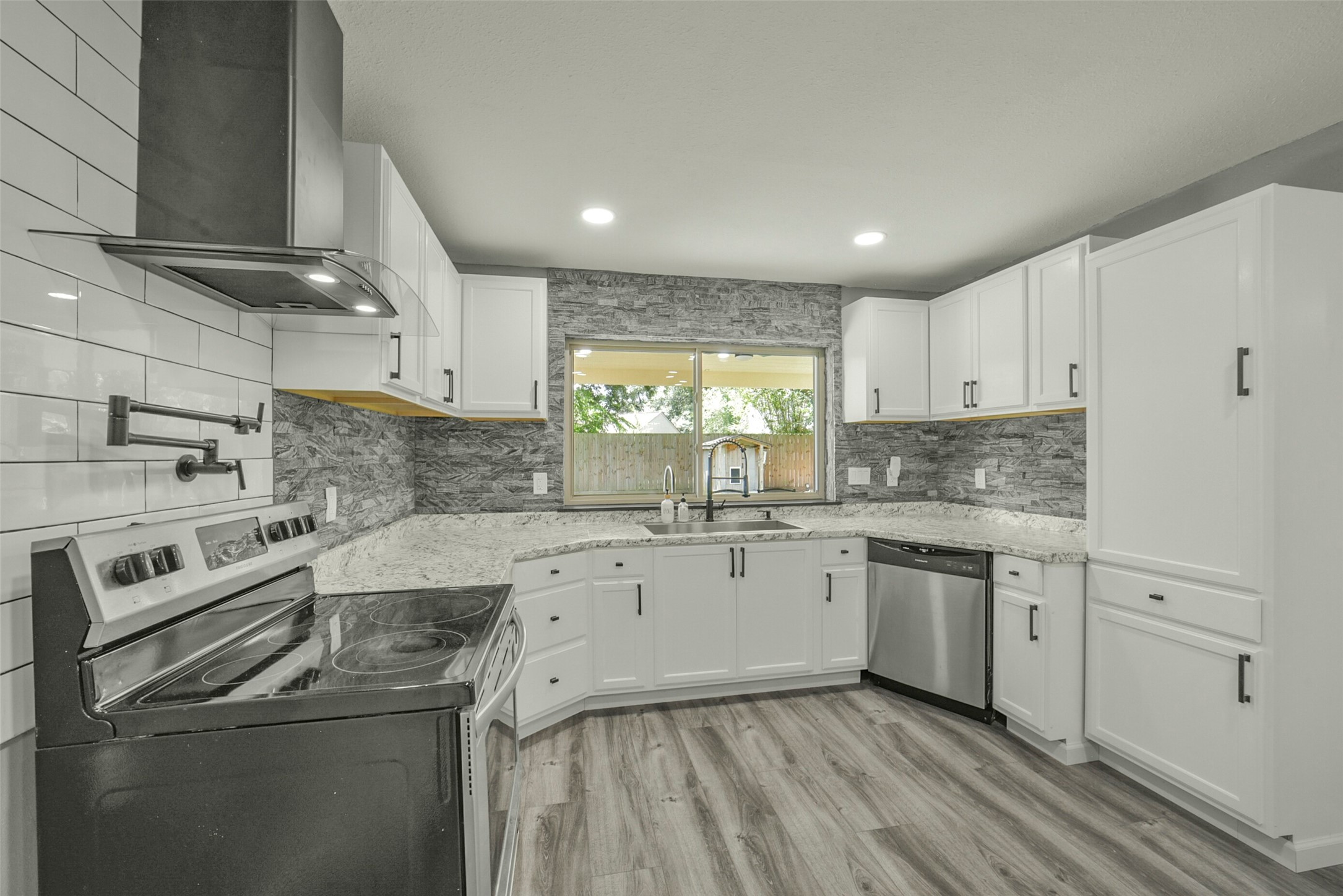 18606 Mellowgrove Lane Spring, TX 77379 - Photo 10 of 43 The stove could be converted to gas