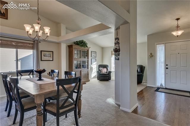 12022 Rio Secco Road Peyton, CO 80831 - Photo 3 of 26 Formal Living Room & Dining Room off Entry