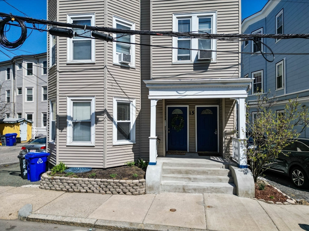 15 Bynner Street, Unit 1 Boston, MA 02130 - Photo 24 of 27 a front view of a house with a yard
