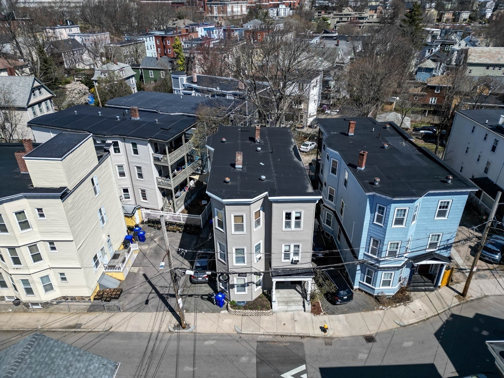 15 Bynner Street, Unit 1 Boston, MA 02130 - Photo 26 of 27 an aerial view of multiple houses with outdoor space