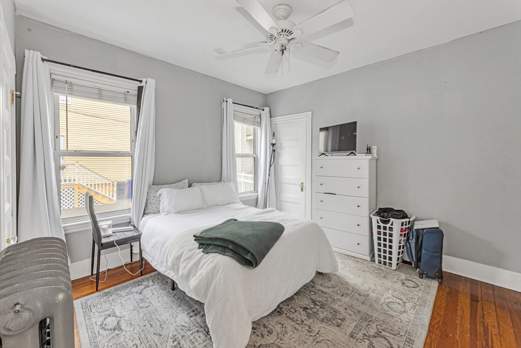 15 Bynner Street, Unit 1 Boston, MA 02130 - Photo 10 of 27 a bedroom with a bed furniture and a window