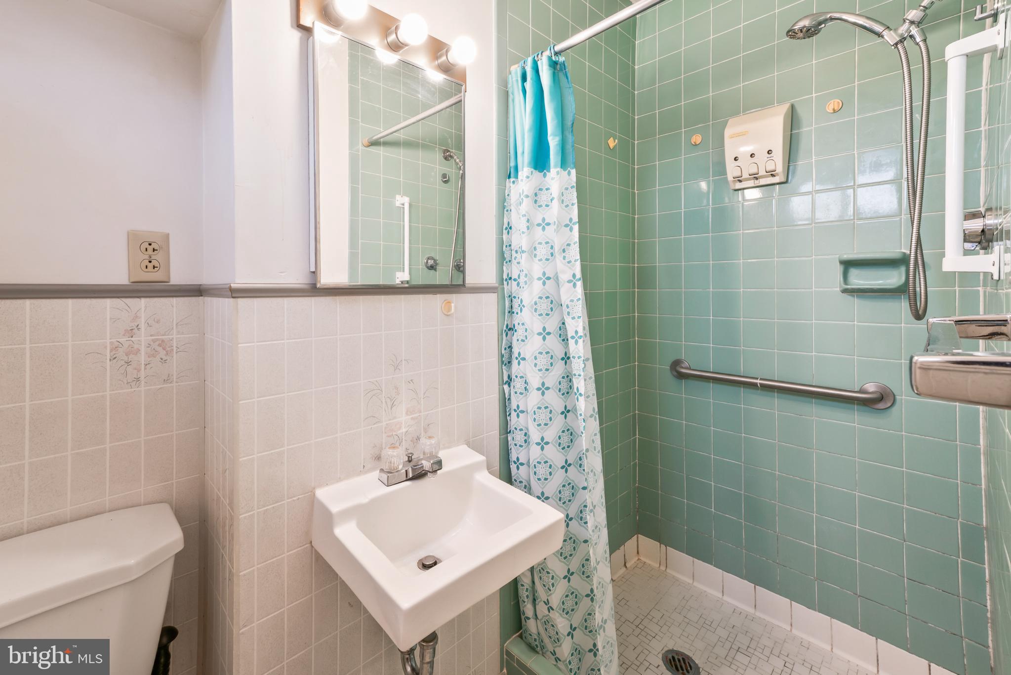 3921 Concord Road Aston, PA 19014 - Photo 21 of 50 Charming vintage primary bathroom w/ teal accents.