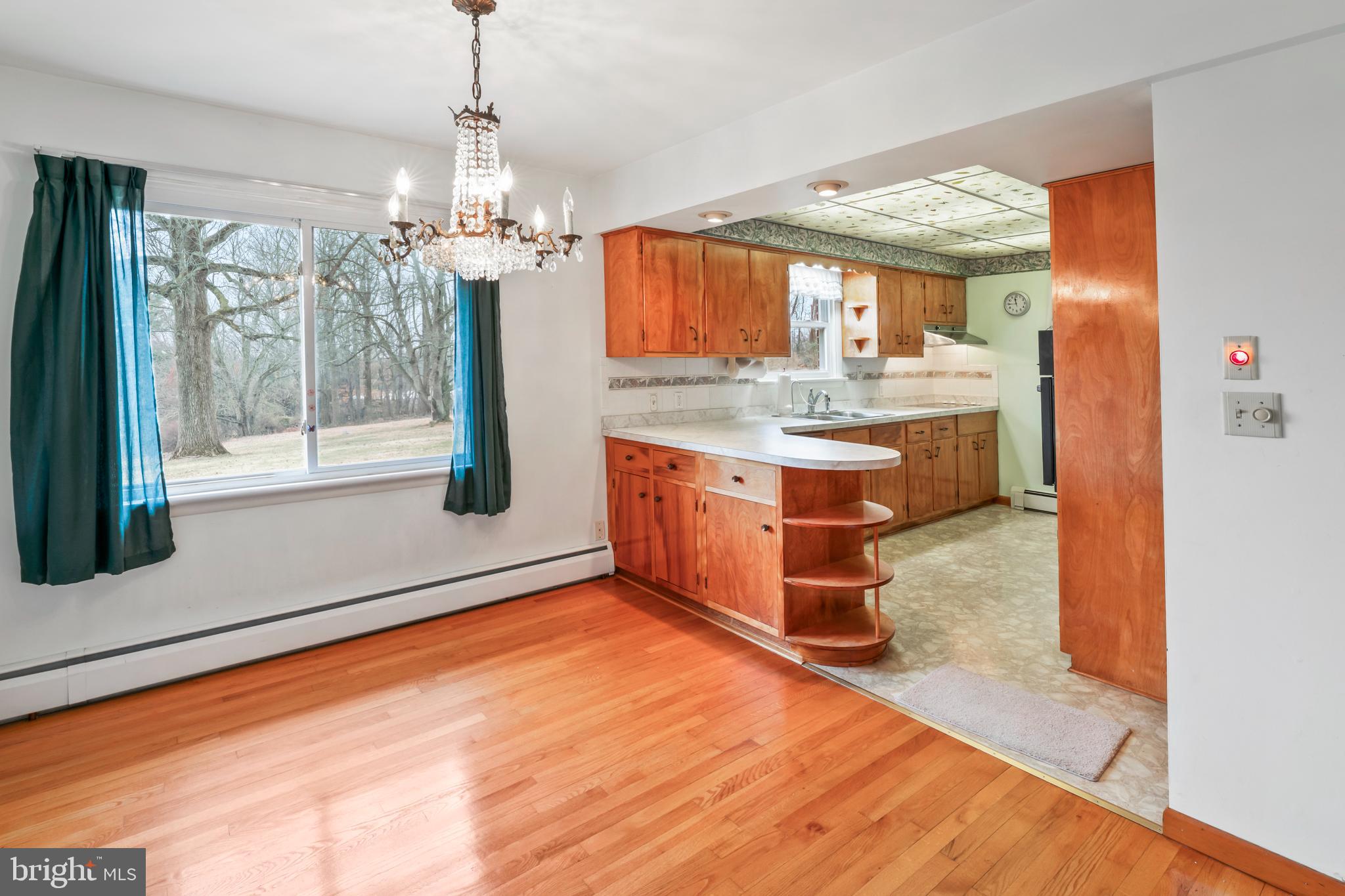 3921 Concord Road Aston, PA 19014 - Photo 25 of 50 Dining Room with penisula into the kitchen