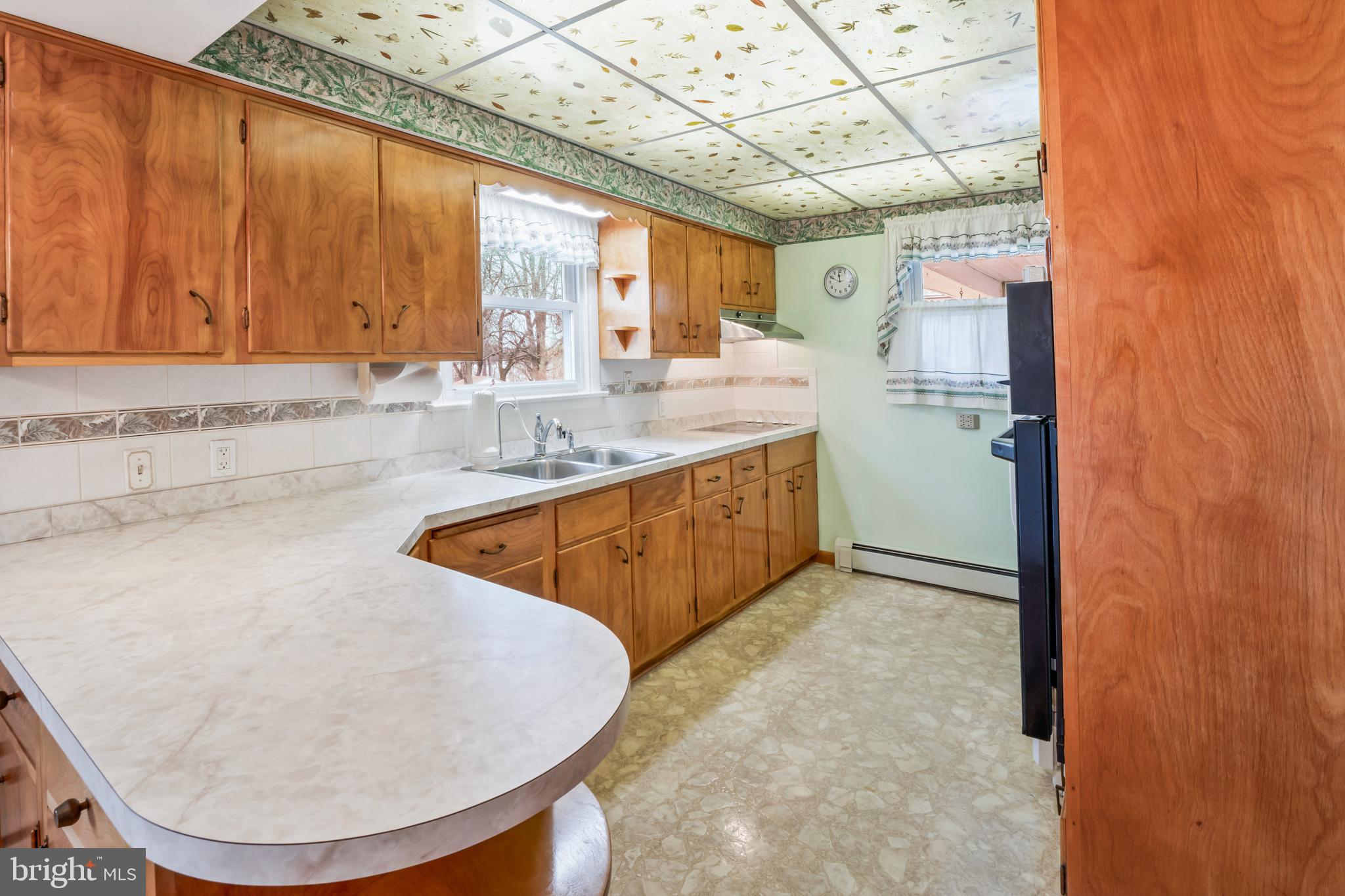 3921 Concord Road Aston, PA 19014 - Photo 30 of 50 Charming kitchen with vintage wood cabinetry.