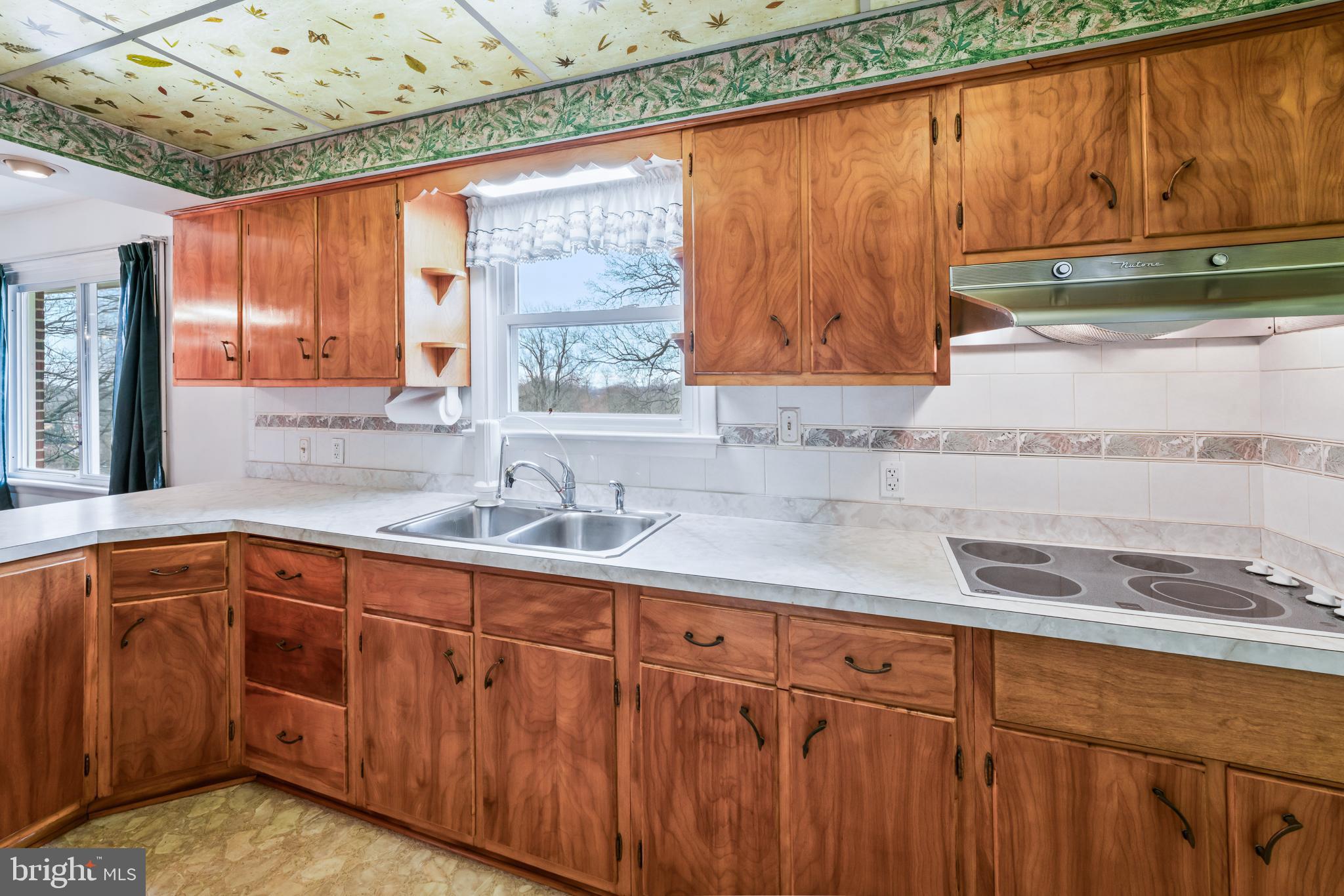 3921 Concord Road Aston, PA 19014 - Photo 33 of 50 Charming kitchen with natural wood accents.