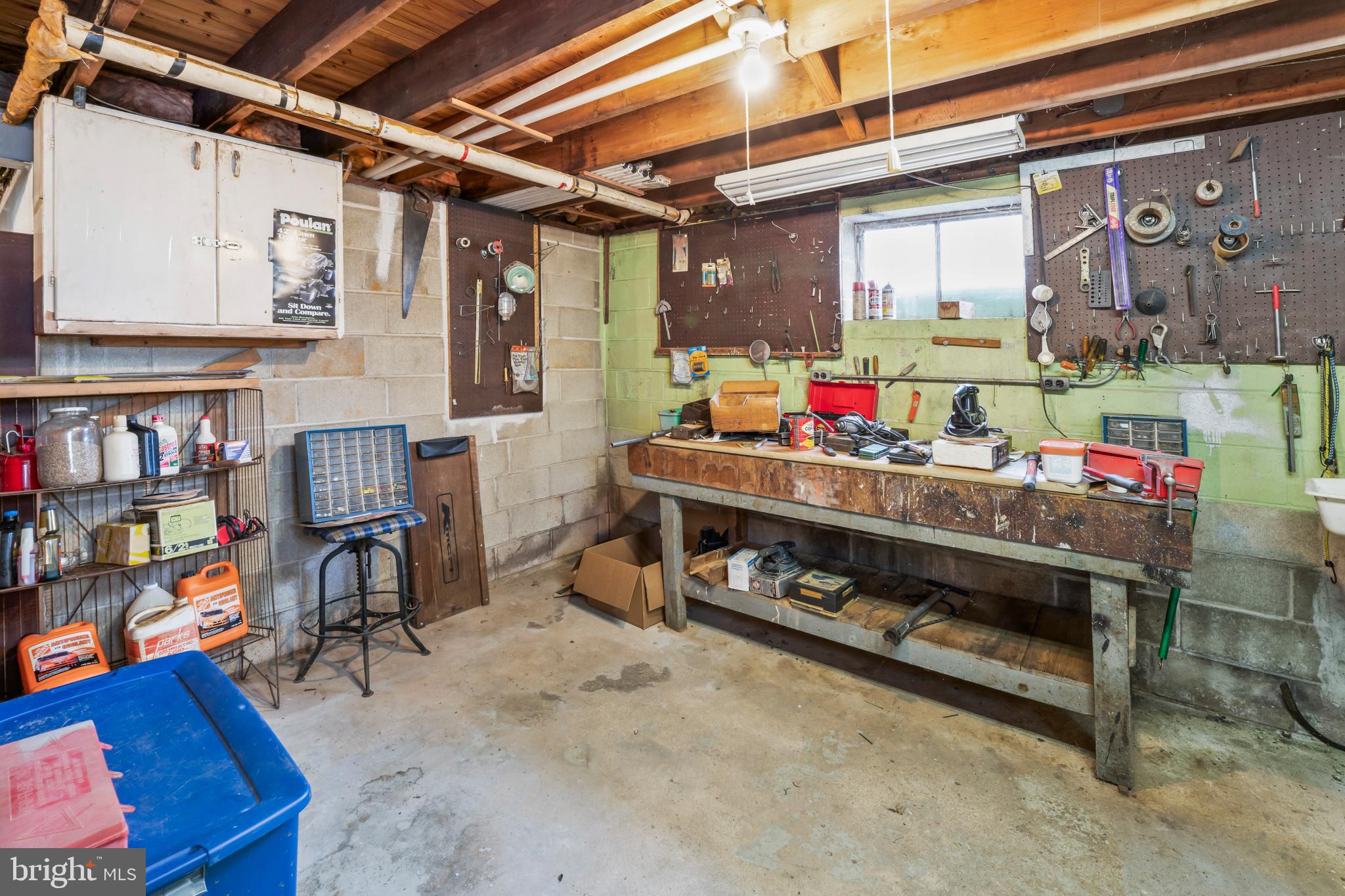 3921 Concord Road Aston, PA 19014 - Photo 39 of 50 Spacious workshop with ample storage options.