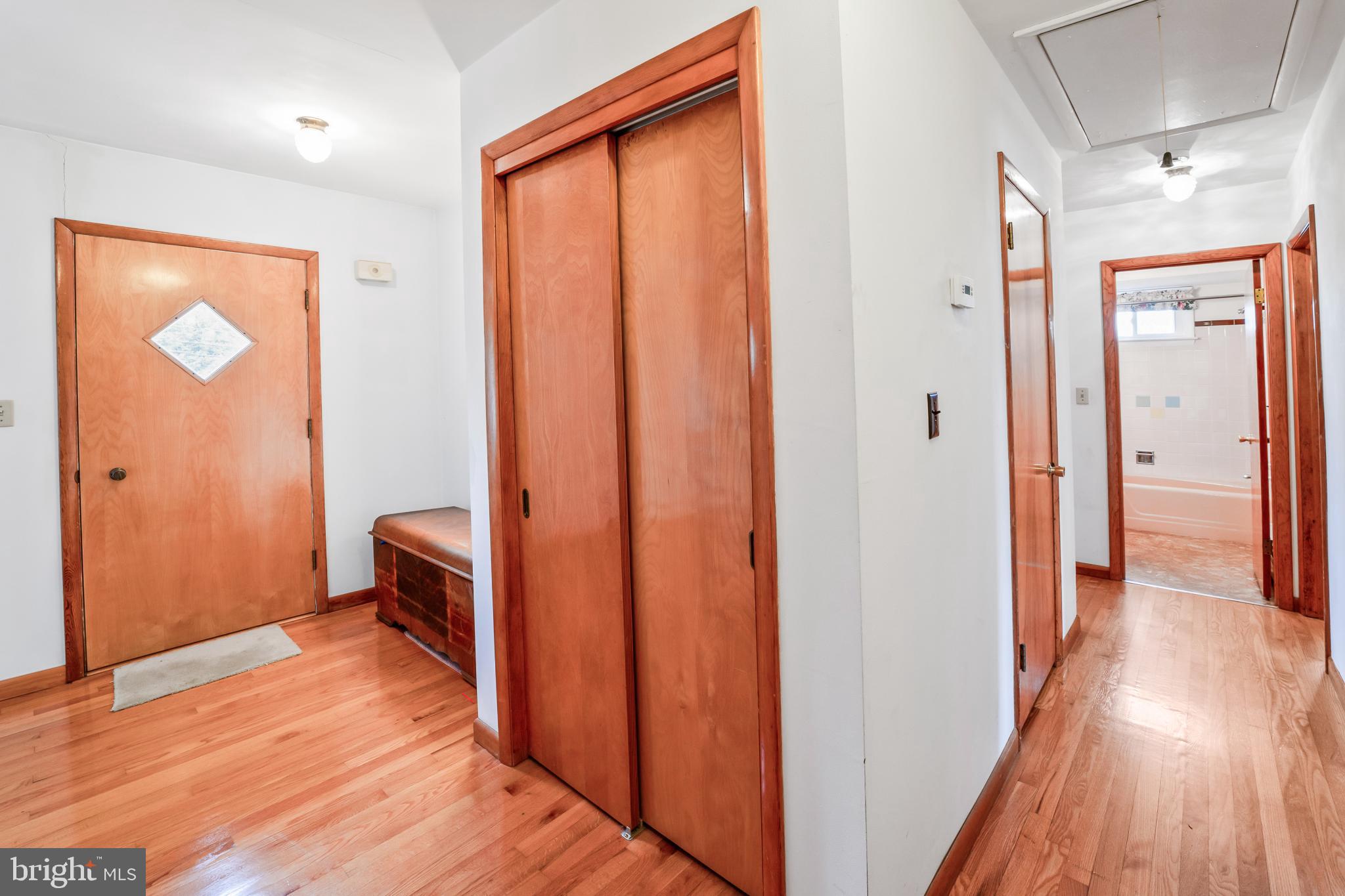 3921 Concord Road Aston, PA 19014 - Photo 7 of 50 Inviting hallway with warm wooden accents.