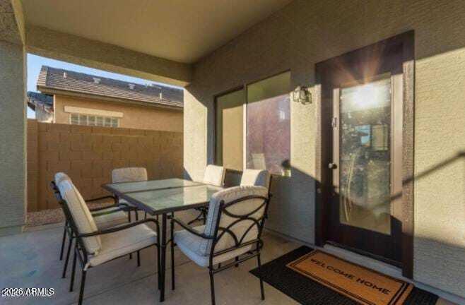 9171 West Berkeley Road Phoenix, AZ 85037 - Photo 27 of 36 a view of a dining room with furniture and a window