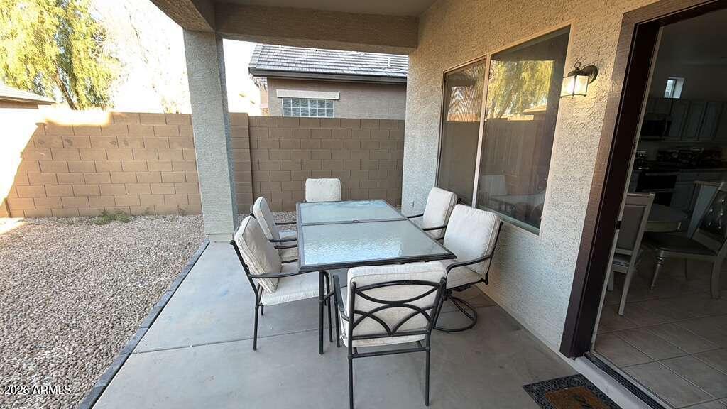 9171 West Berkeley Road Phoenix, AZ 85037 - Photo 29 of 36 a view of an outdoor space with seating area