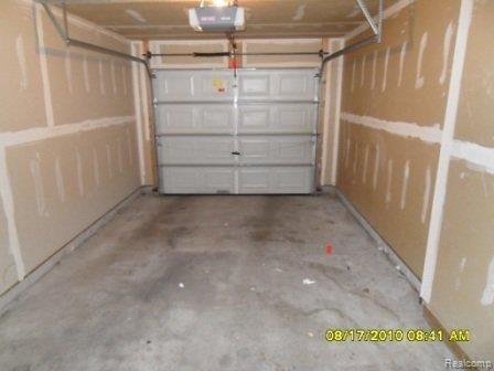 20626 Dunham Road Clinton Township, MI 48038 - Photo 11 of 13 garage insisde