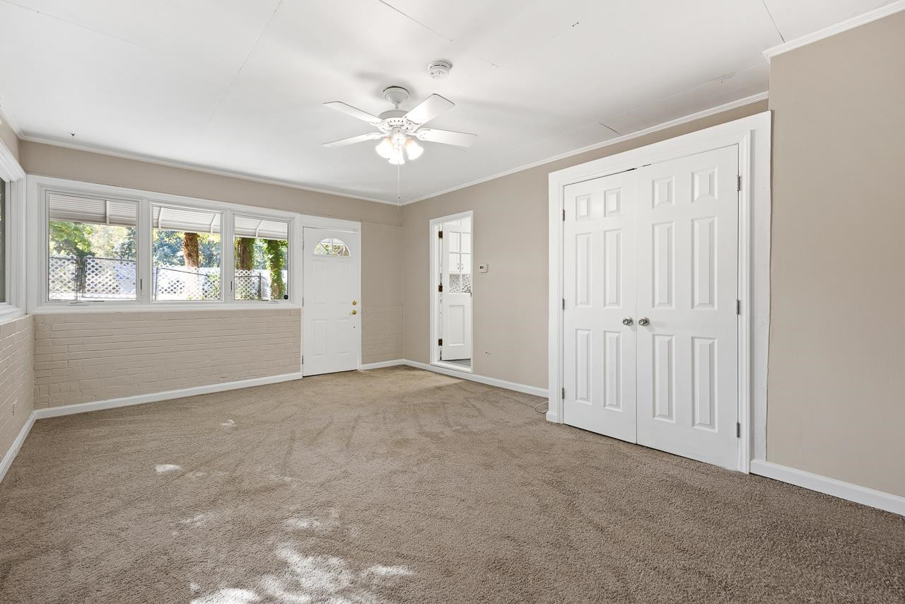 3517 Brecknock Street Durham, NC 27705 - Photo 12 of 38 a view of an empty room with a window