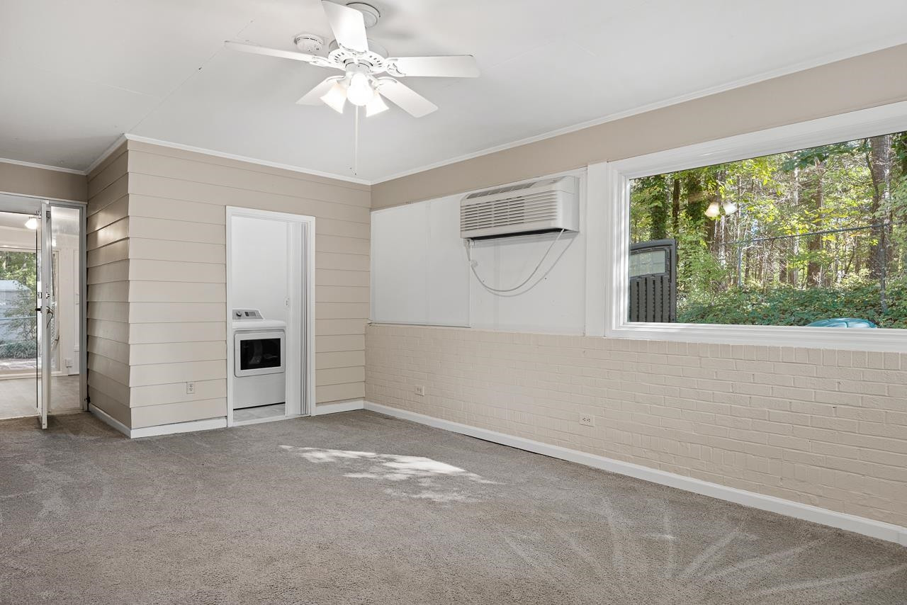 3517 Brecknock Street Durham, NC 27705 - Photo 13 of 38 an empty room with windows and entrance