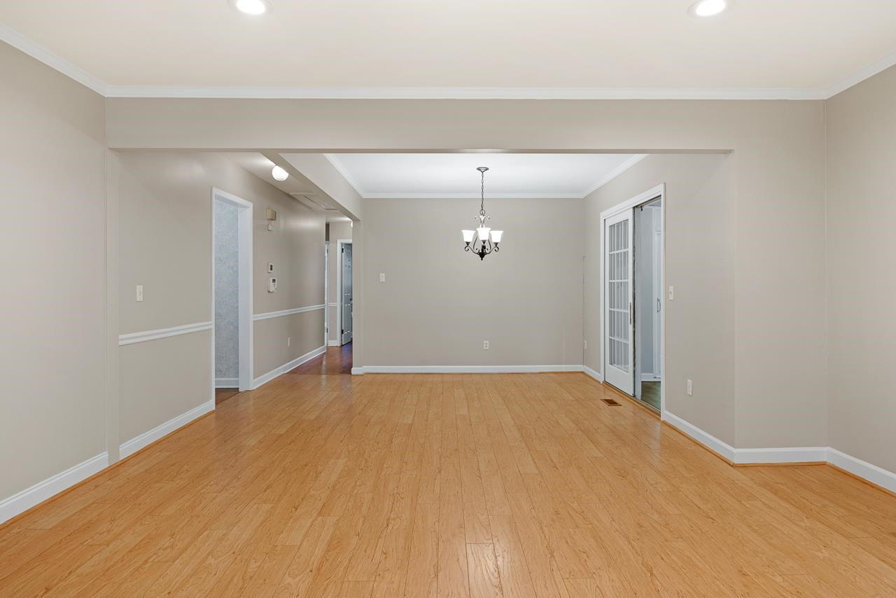 3517 Brecknock Street Durham, NC 27705 - Photo 17 of 38 a view of an empty room with a window