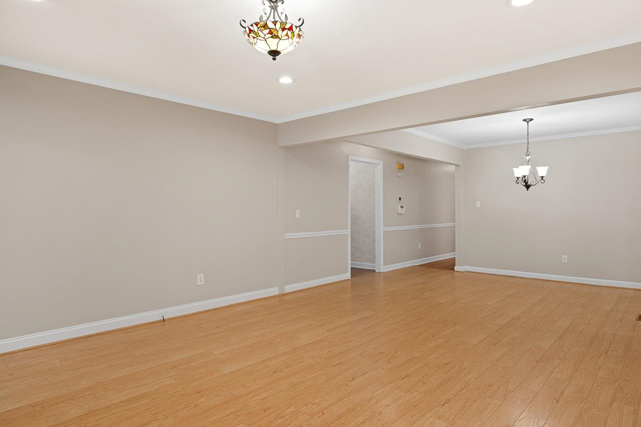 3517 Brecknock Street Durham, NC 27705 - Photo 18 of 38 an empty room with a empty space and windows