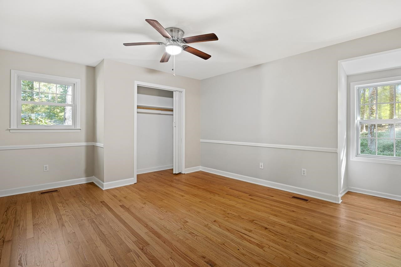3517 Brecknock Street Durham, NC 27705 - Photo 20 of 38 wooden floor in an empty room with a window