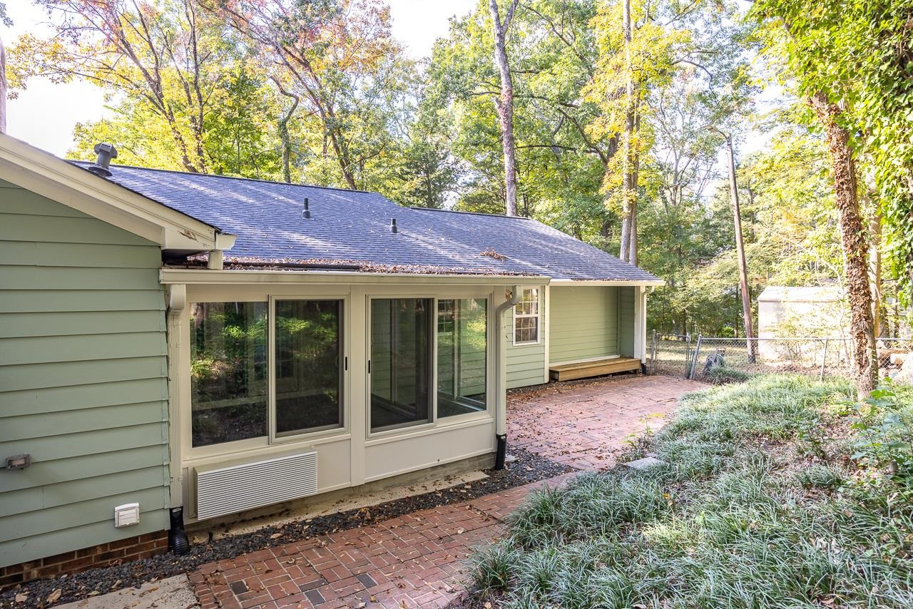 3517 Brecknock Street Durham, NC 27705 - Photo 26 of 38 a view of a house with a yard and sitting area