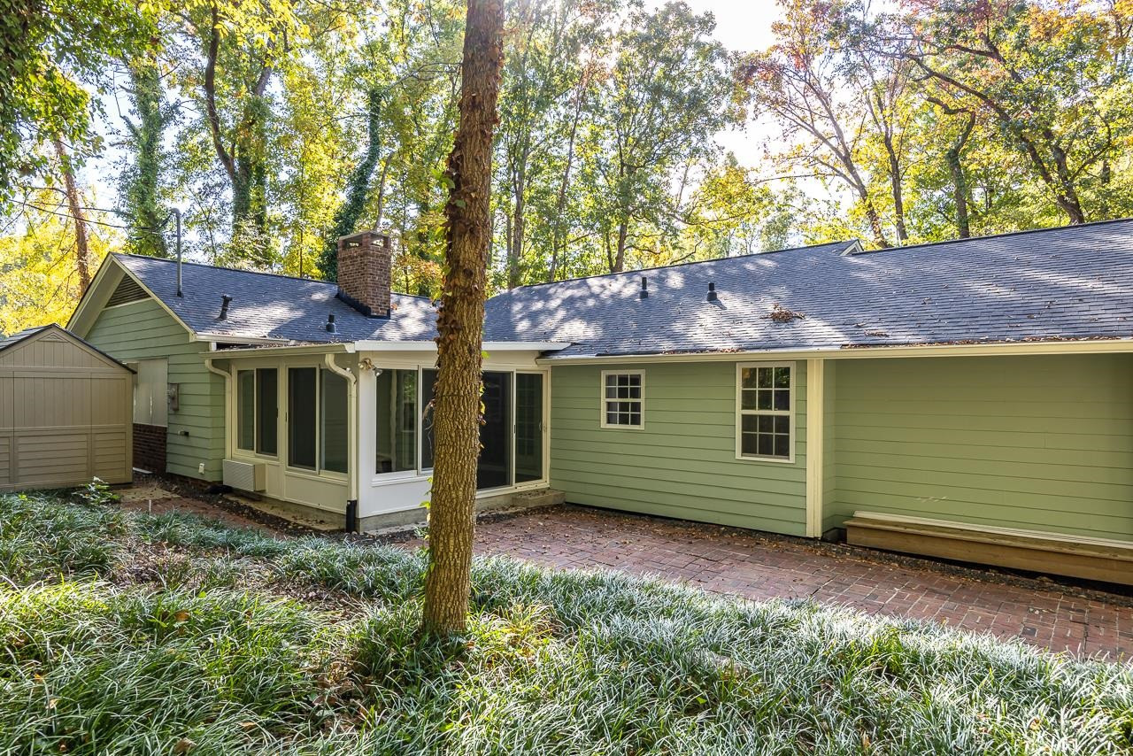 3517 Brecknock Street Durham, NC 27705 - Photo 29 of 38 a view of a house with a yard