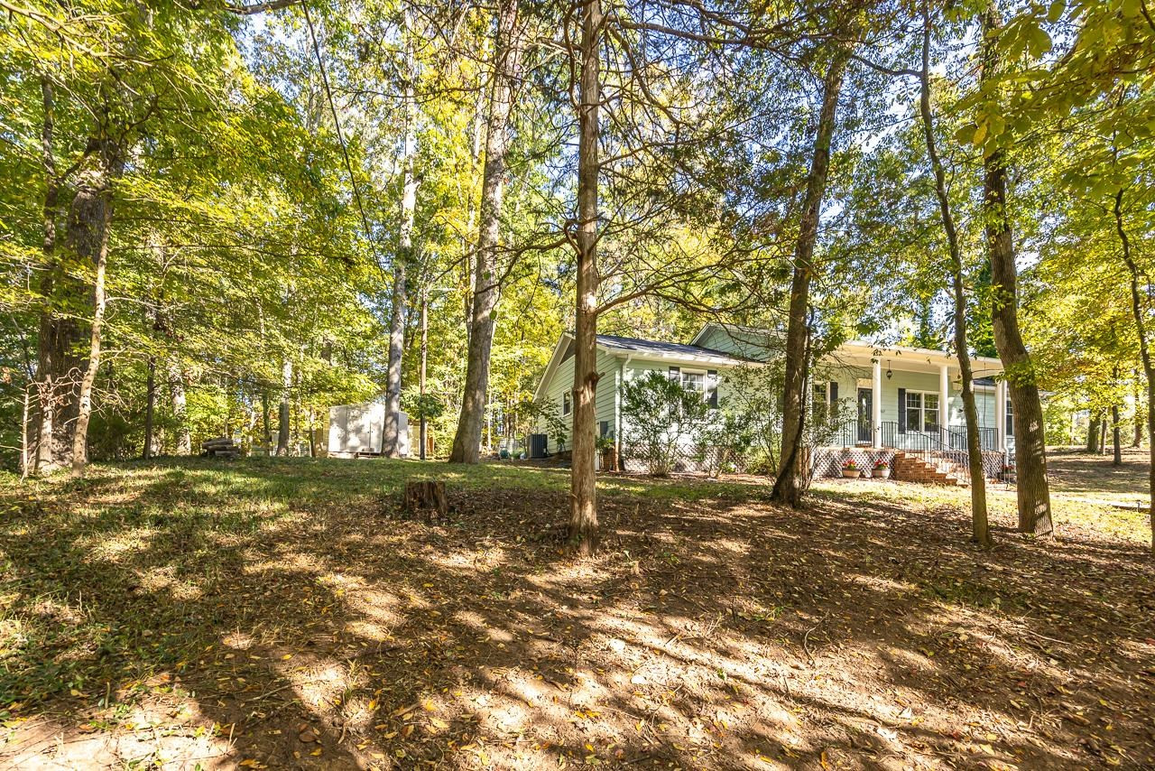 3517 Brecknock Street Durham, NC 27705 - Photo 36 of 38 a big yard with trees