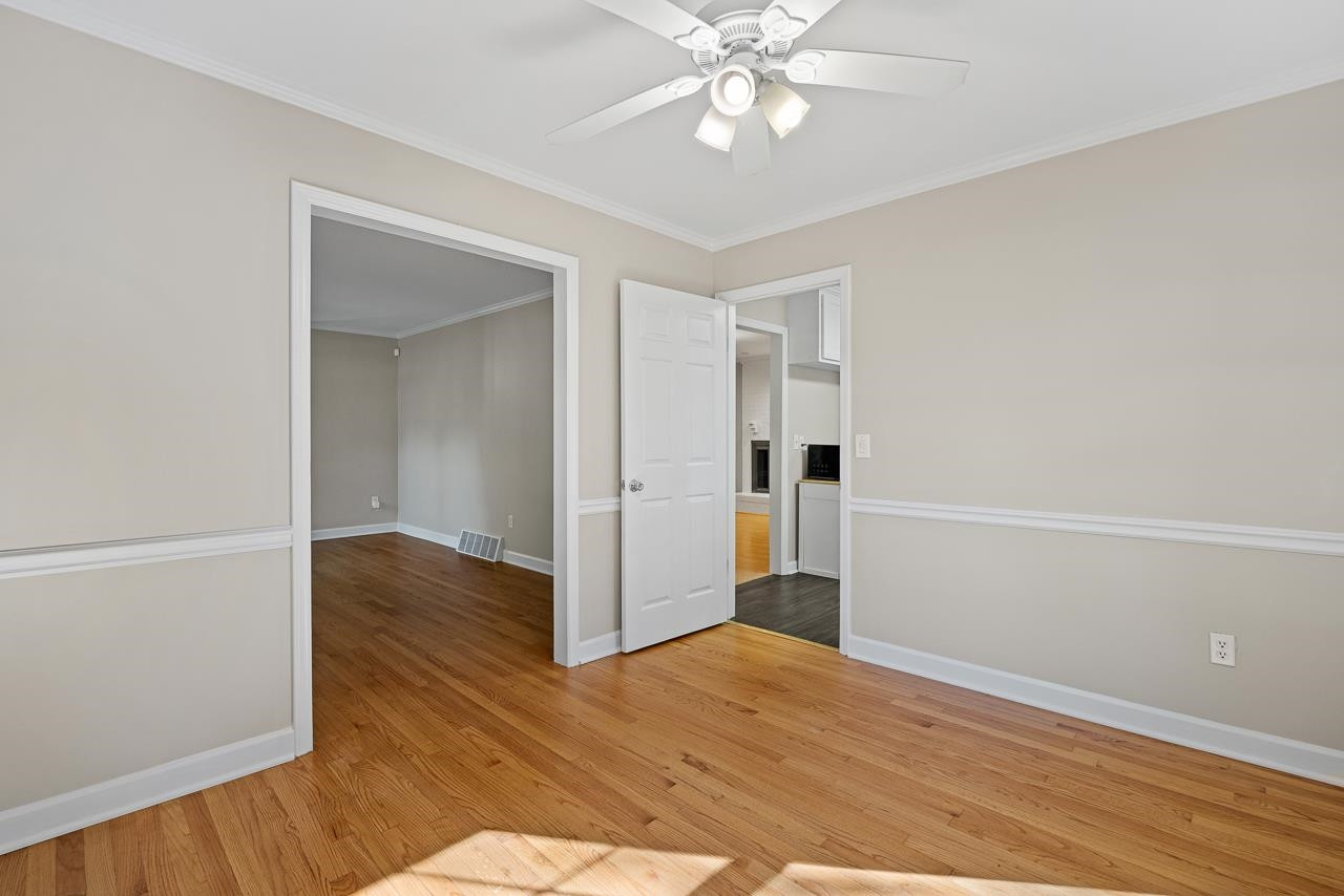 3517 Brecknock Street Durham, NC 27705 - Photo 7 of 38 a view of a livingroom with wooden floor