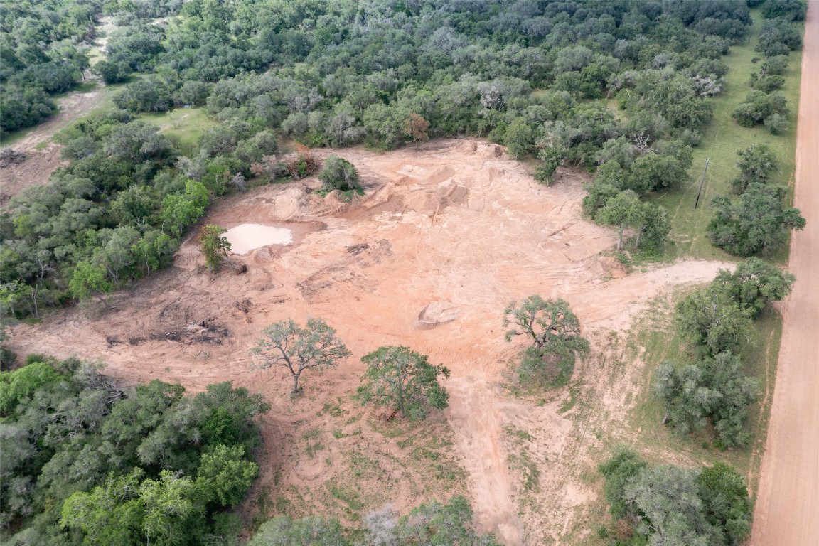 24.68-acres Cattle Guard Road Cuero, TX 77954 - Photo 14 of 49 an aerial view of mountain with yard and green space