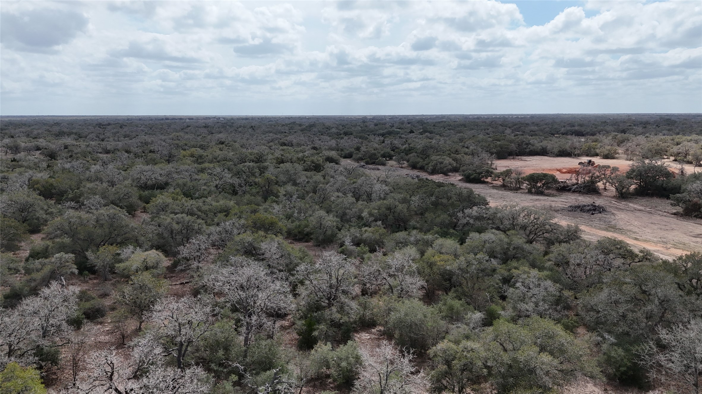 24.68-acres Cattle Guard Road Cuero, TX 77954 - Photo 48 of 49 an aerial view of houses covered with fog