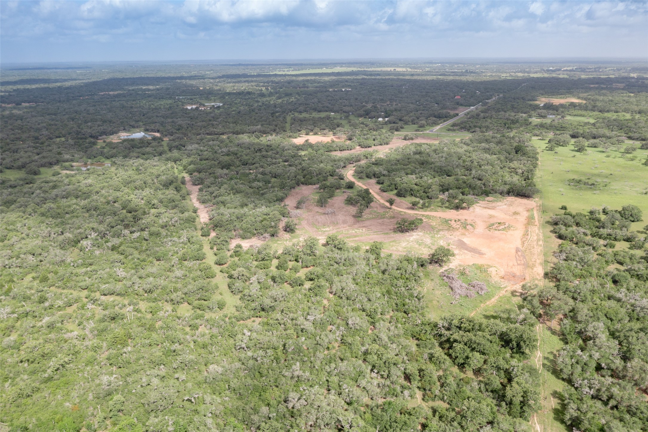 24.68-acres Cattle Guard Road Cuero, TX 77954 - Photo 6 of 49 a view of lake view with beach