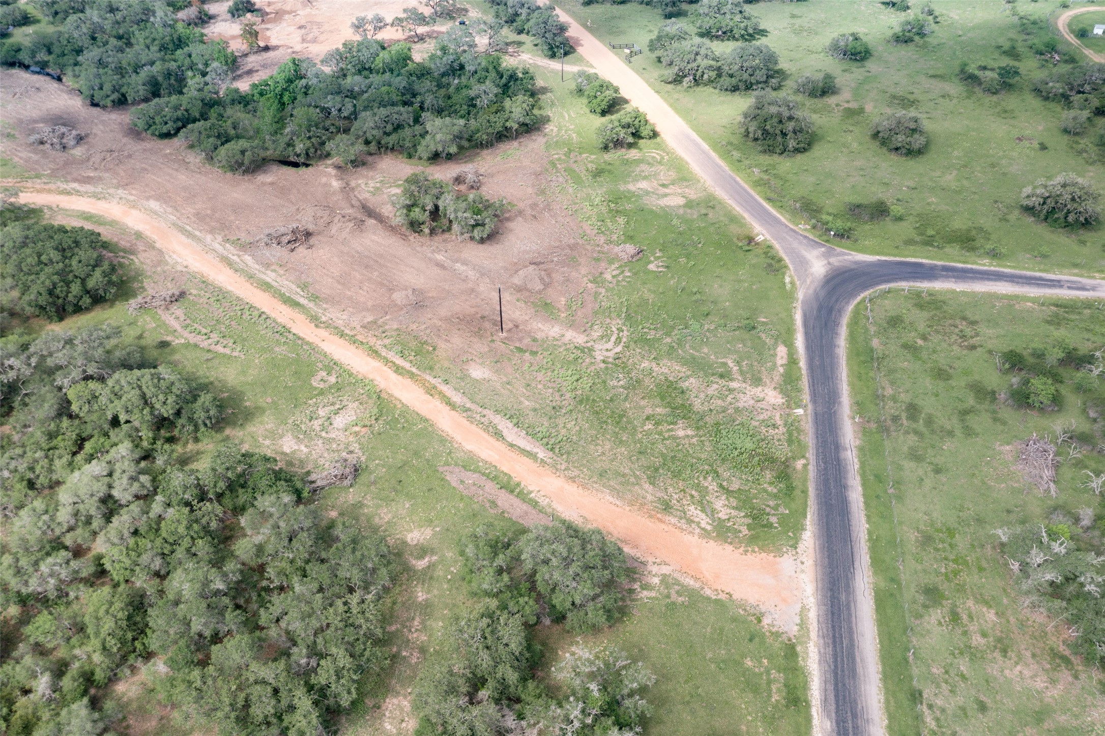 24.68-acres Cattle Guard Road Cuero, TX 77954 - Photo 10 of 49 a view of a yard with potted plants