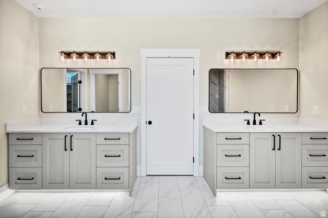 840 South Jones Road Monroe, UT 84754 - Photo 20 of 52 Dual vanities with undermount sinks, quartz countertops, and matte black fixtures