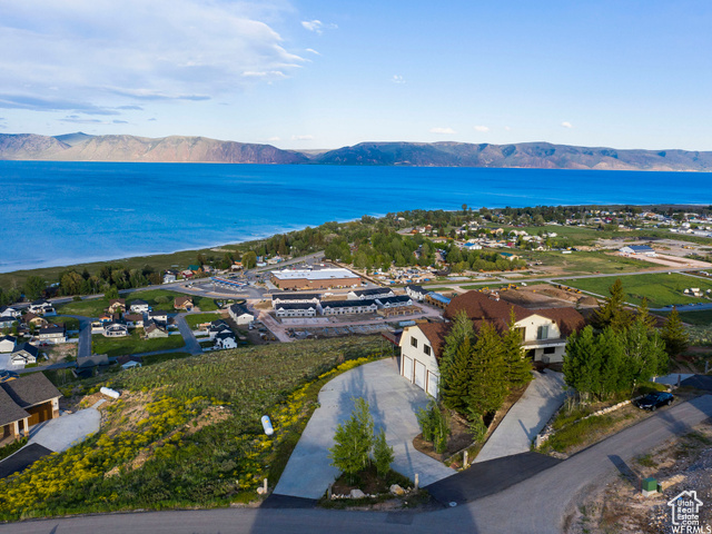 588 Raspberry Patch Road Garden City, UT 84028 - Photo 68 of 74 Aerial view of residential area with a water and mountain view