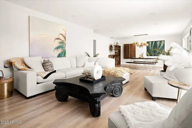 a living room with furniture and a couch