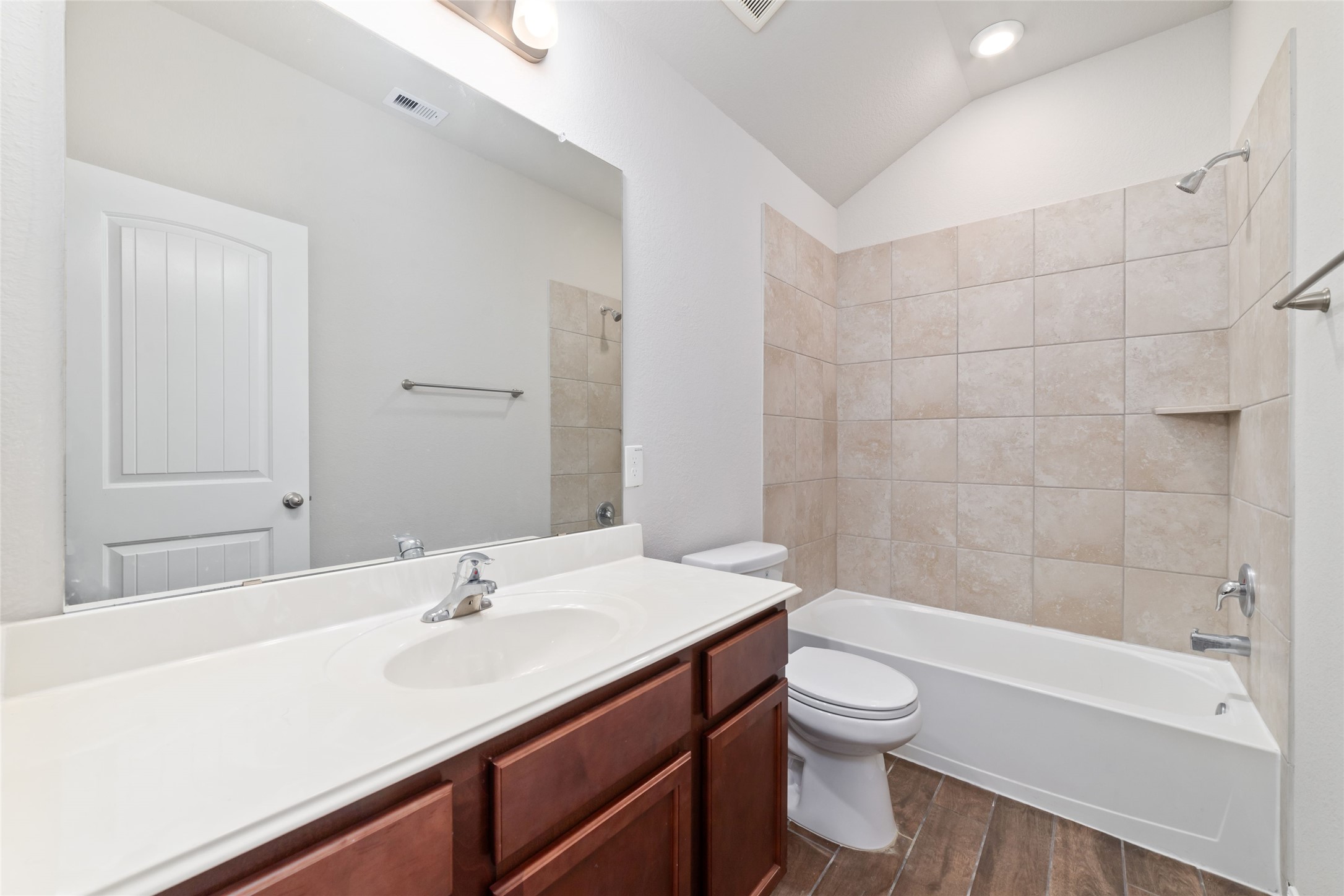 21622 Buttonsage Lane Katy, TX 77449 - Photo 10 of 17 a bathroom with a sink a toilet and shower