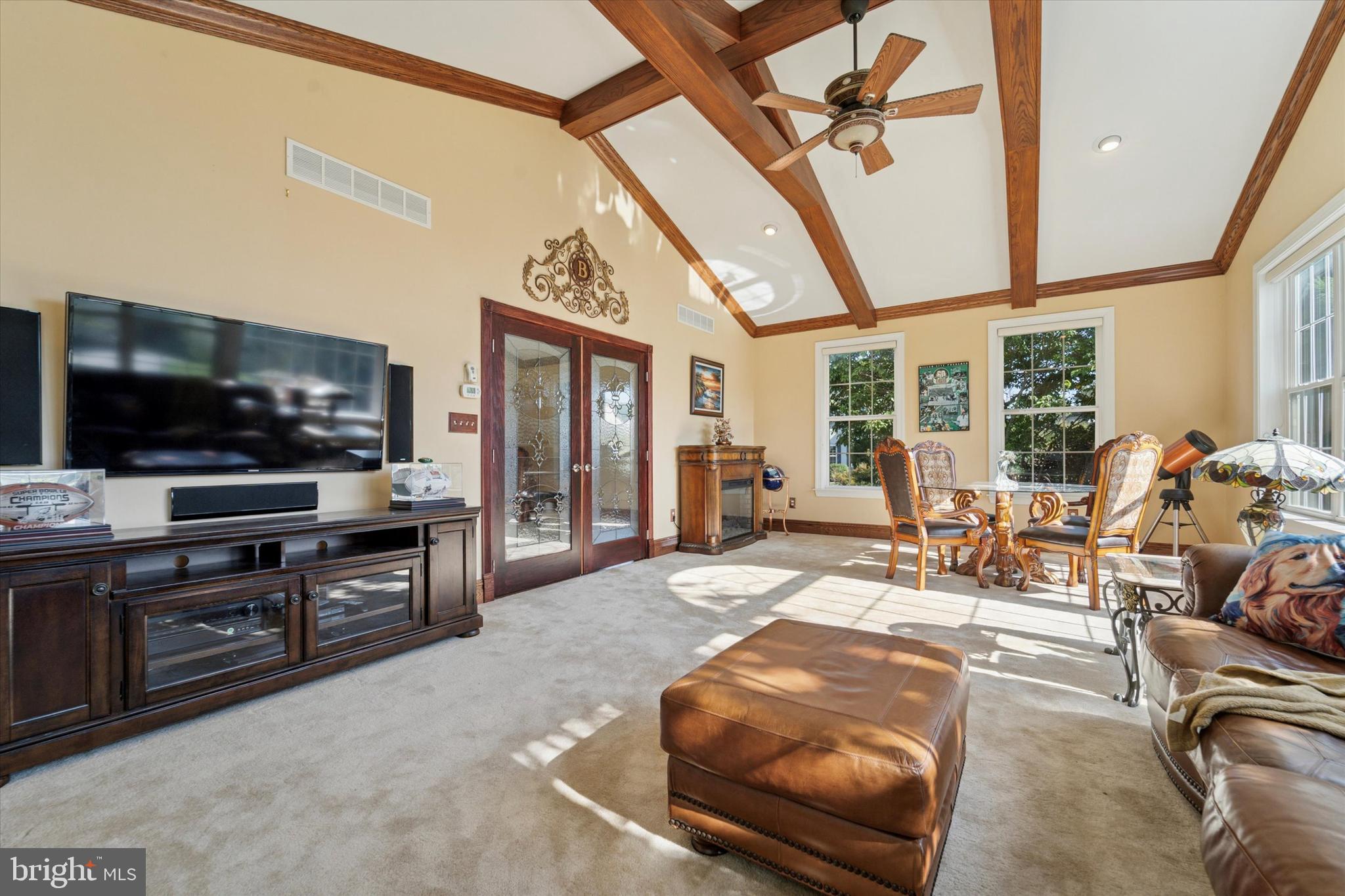 2001 Grenoble Road Coatesville, PA 19320 - Photo 15 of 45 a living room with furniture and a flat screen tv