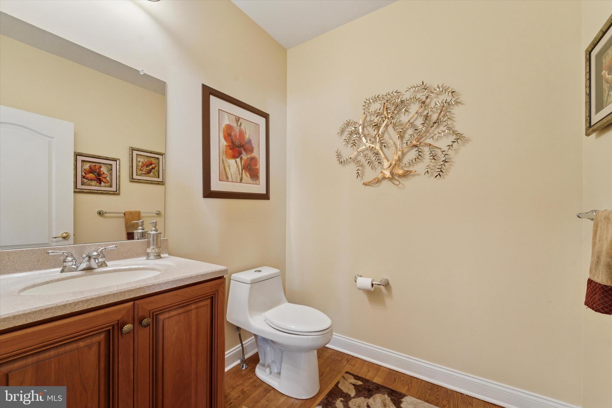 2001 Grenoble Road Coatesville, PA 19320 - Photo 17 of 45 a bathroom with a sink mirror vanity and toilet